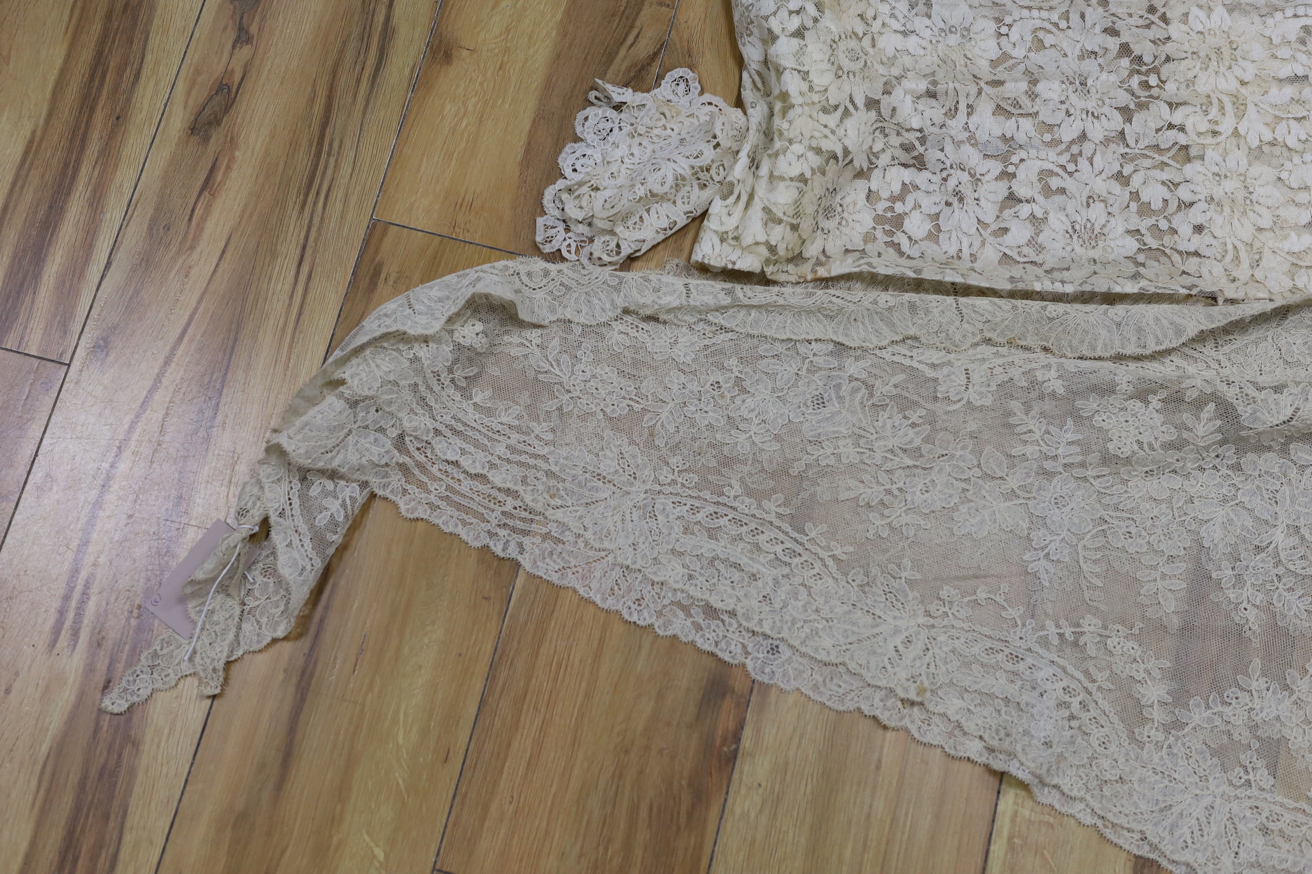 Two pieces of machine lace and a Honiton lace table mat